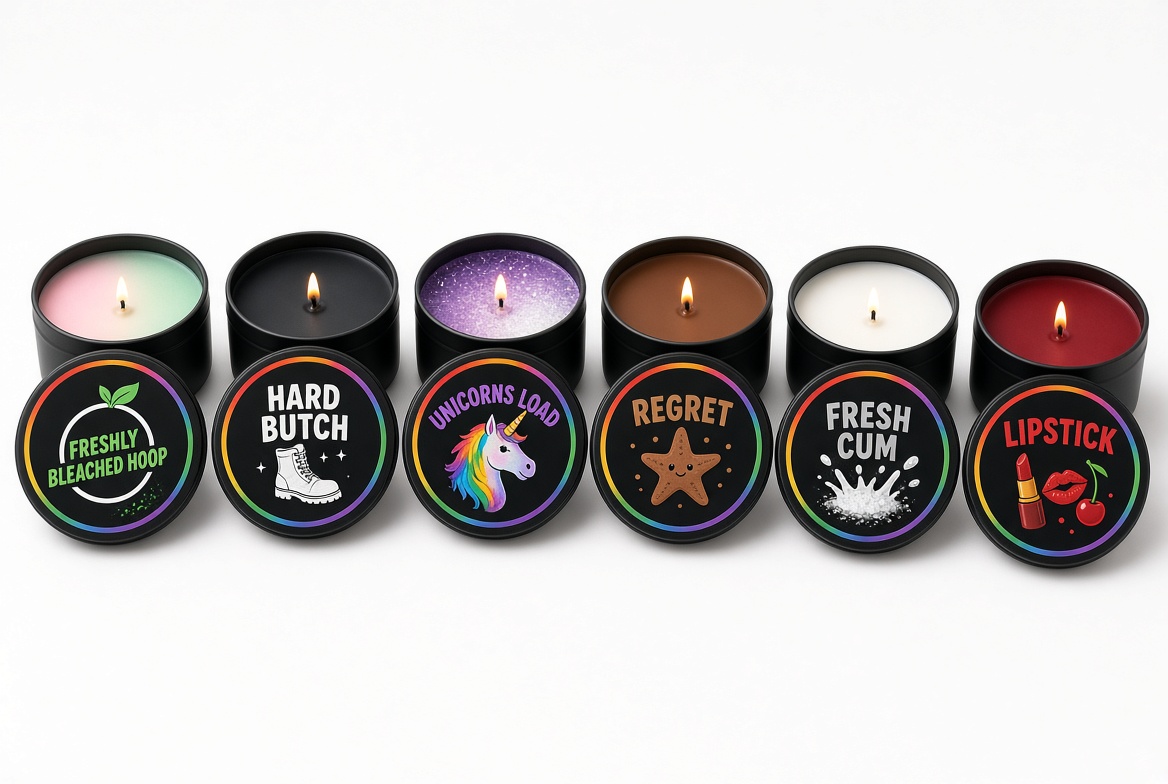 Six Gay By Design candles in black tins: Freshly Bleached Hoop, Hard Butch, Unicorns Load, Regret, Fresh Cum and Lipstick